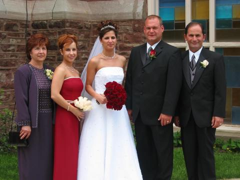 Bride, groom, bride's parents and sister
