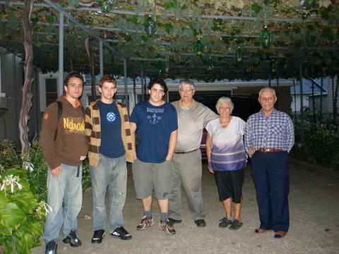 Under the grapes